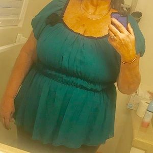 Lovely teal green blouse with black accent flower